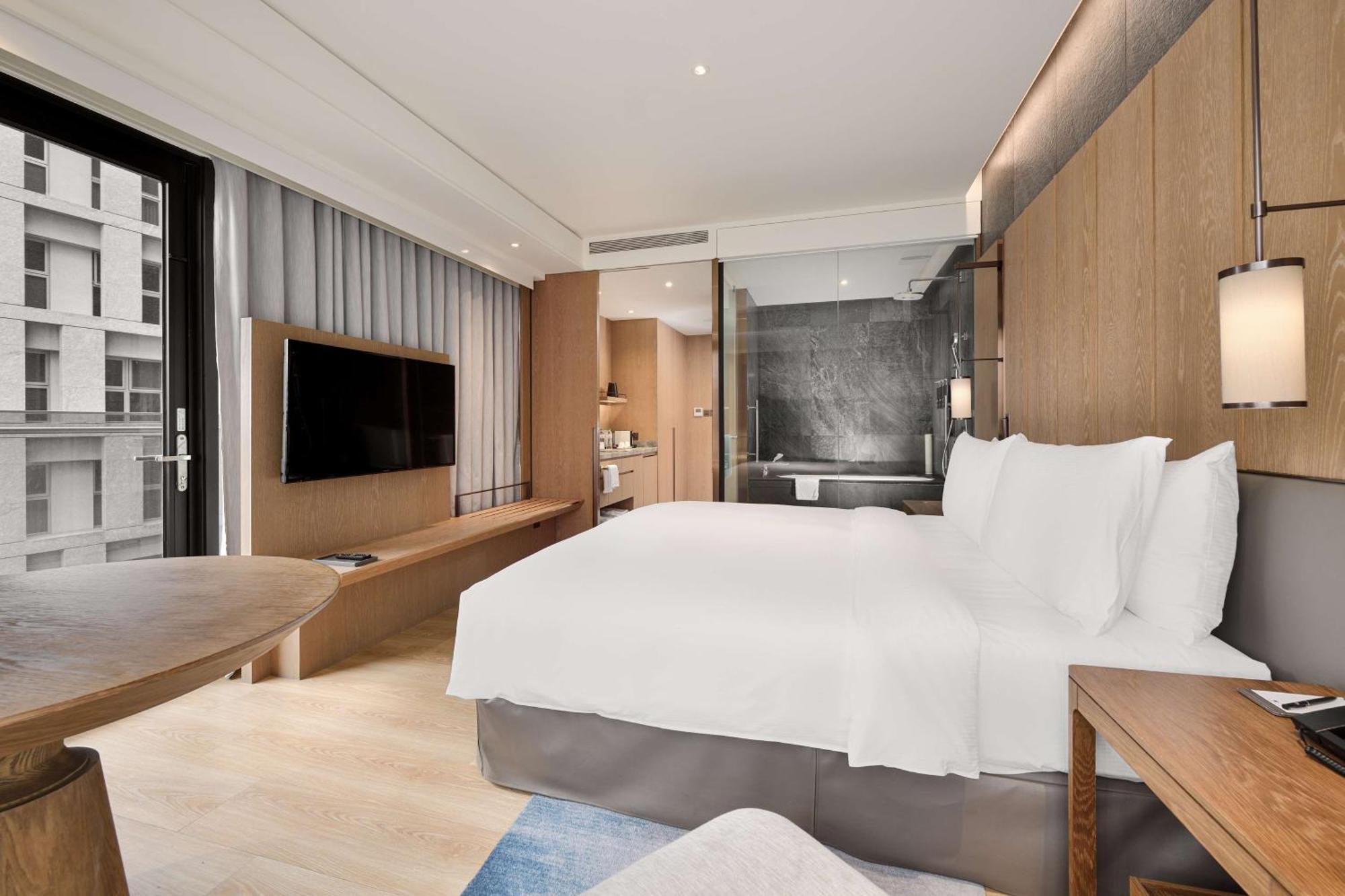 Hoek Kamer met Kingsize Bed - Balkon